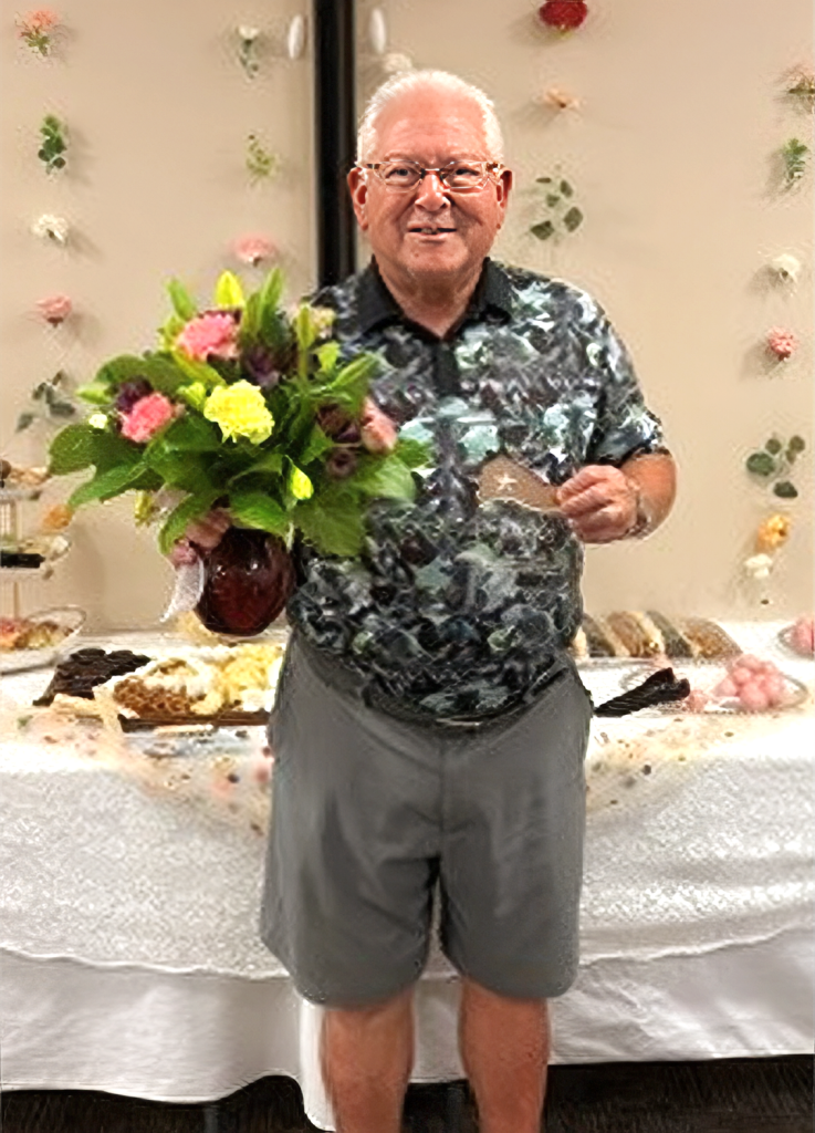 Hospital auxiliary honored at reception, Bob Alldredge selected Auxilian of the Year